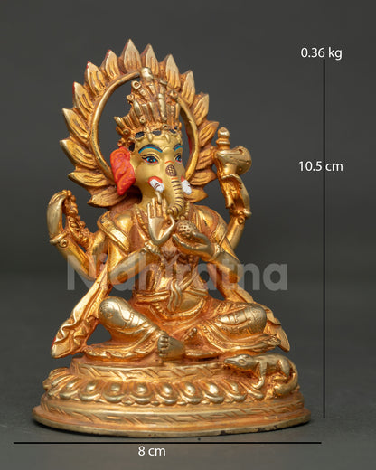 Side view of copper Ganesha statue with lotus throne and gold finish