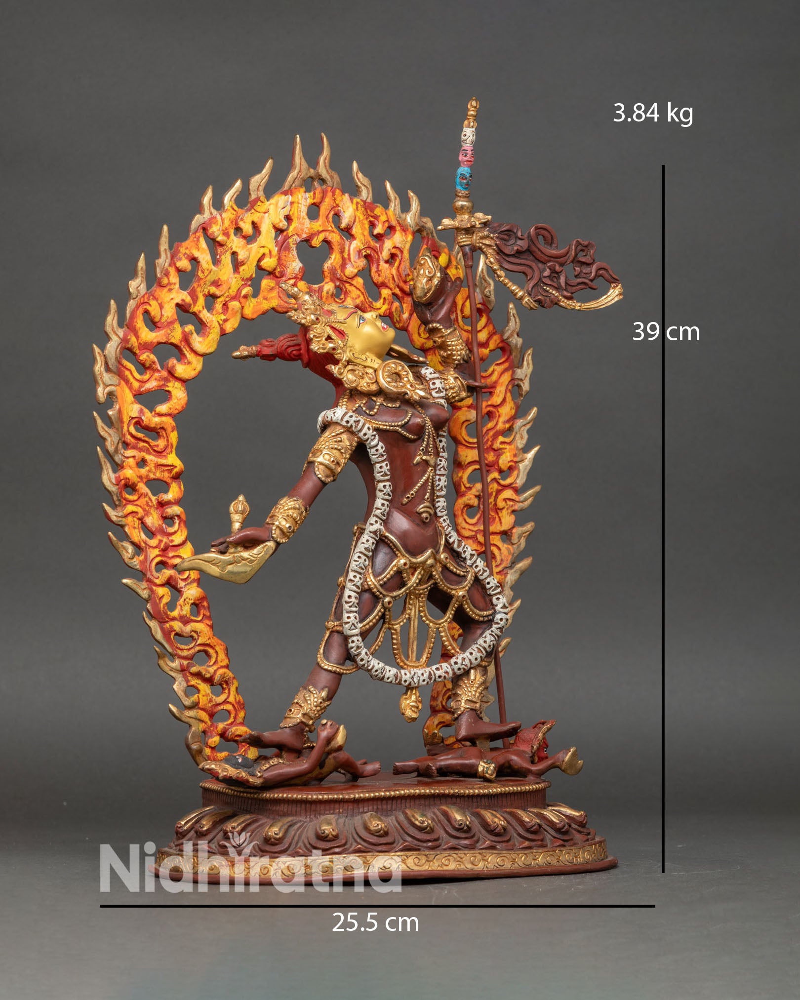 Side view of Dorje Narjolma in dynamic posture with subdued figures and flowing robes