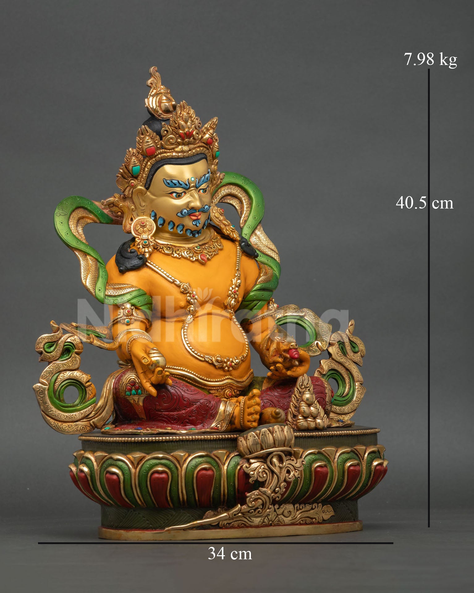 Side view of Dzambhala statue, a Himalayan wealth deity sculpture with detailed metal craftsmanship and traditional sacred Nepalese artistry