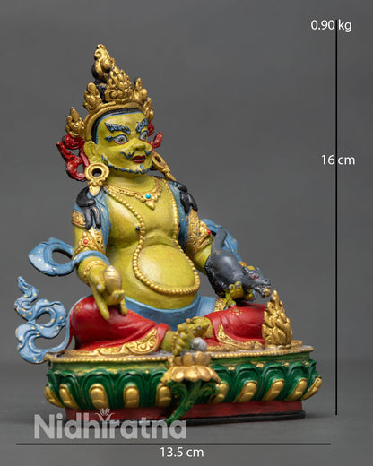 Side view Dzambhala statue holding citron fruit and mongoose symbolizing abundance and removal of financial obstacles