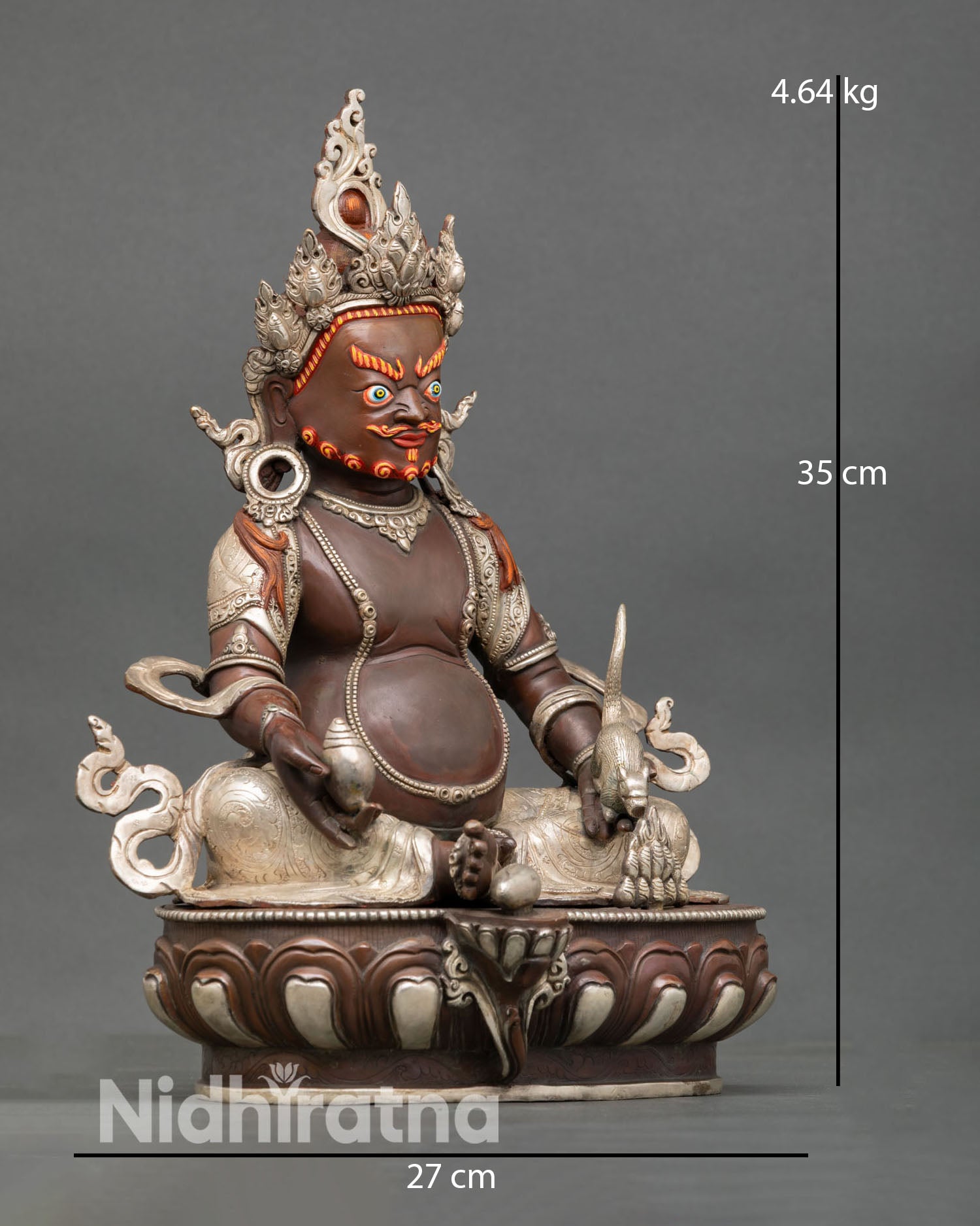 Side view of Dzambhala statue, silver plated finish Nepalese craftsmanship prosperity deity spiritual decor