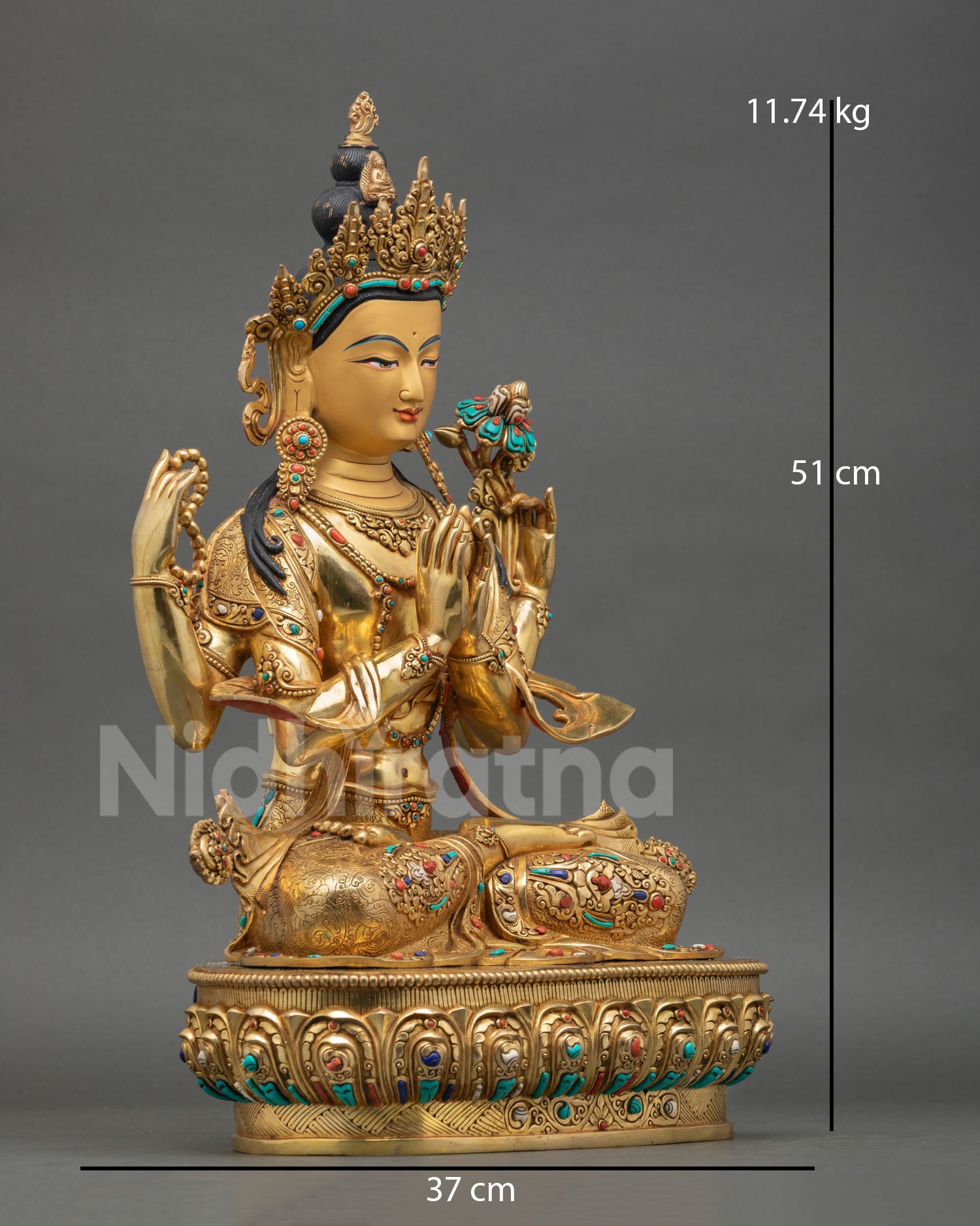 Side view of four armed Chenrezig statue handcrafted copper Buddhist art from Patan Nepal wish fulfilling jewel meditation decor