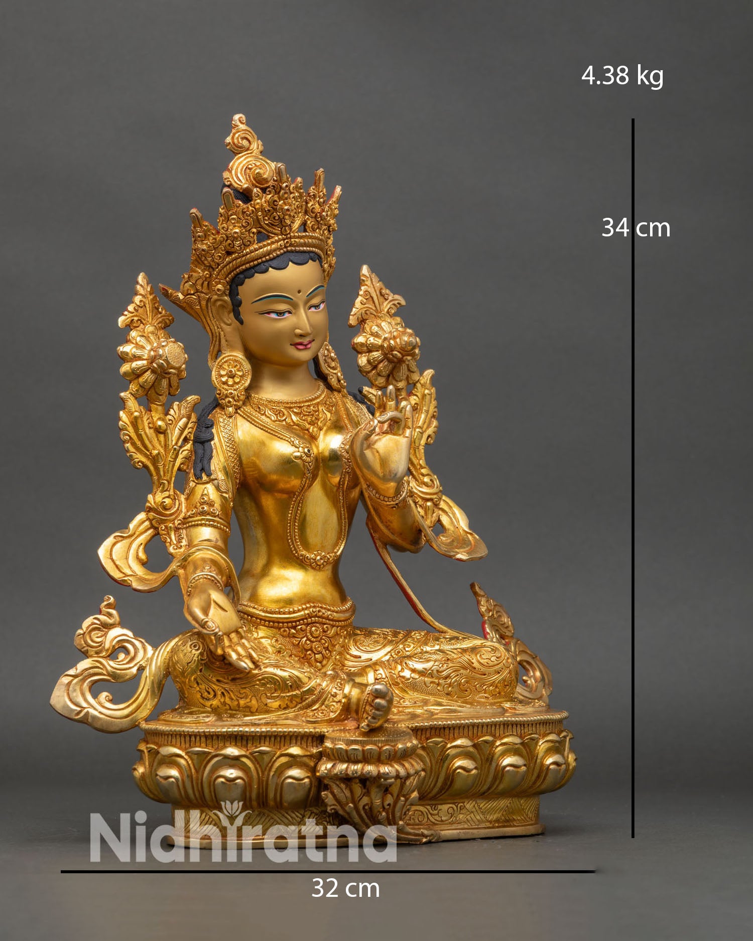 Side view Green Tara statue lotus pedestal extended leg flowing robes spiritual decor