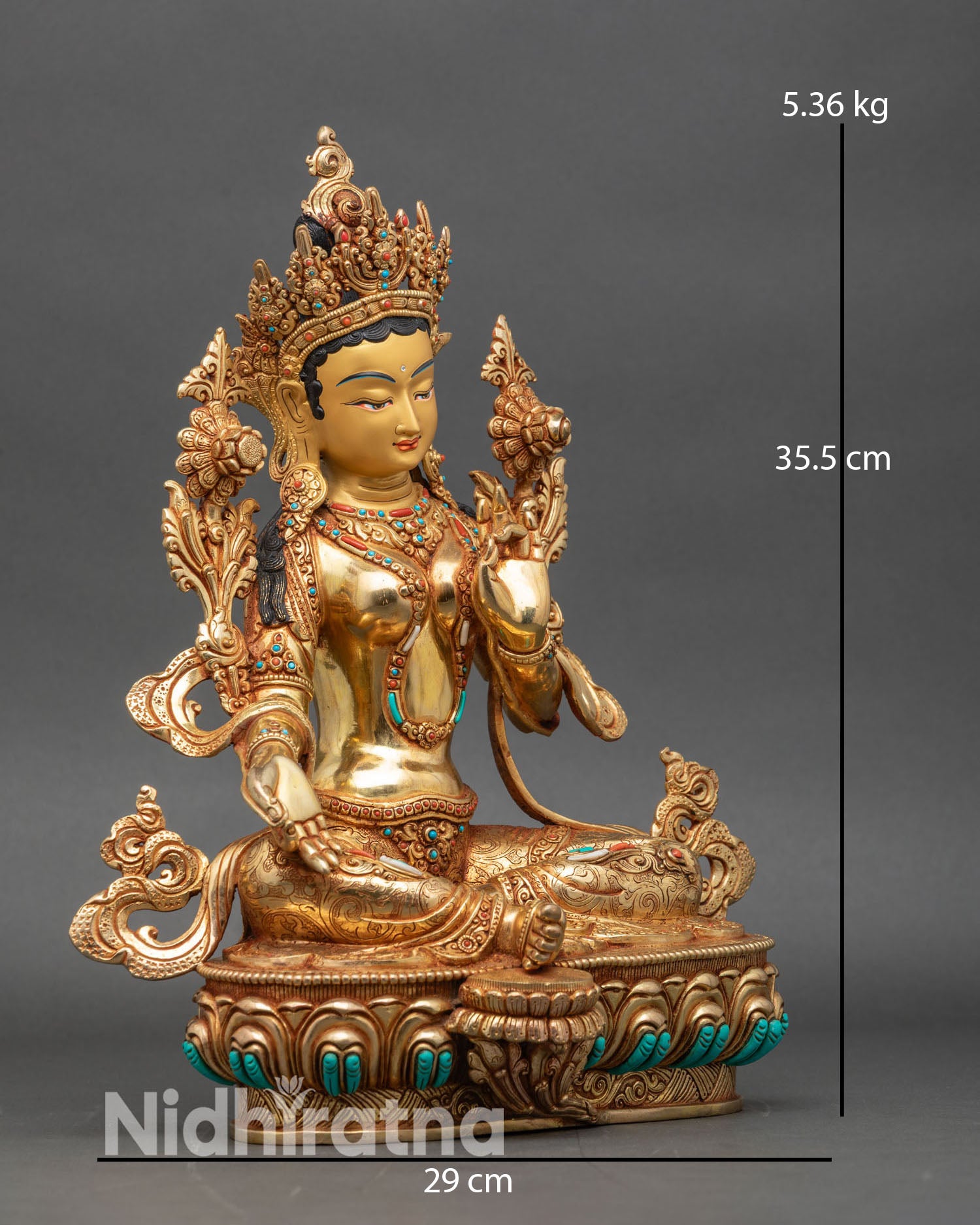 Side view Green Tara statue lotus pedestal varada abhaya mudras sacred art
