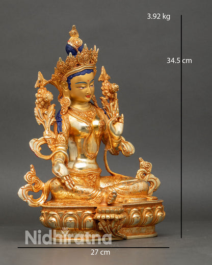 side view Green Tara statue lotus posture extended leg compassion symbolism