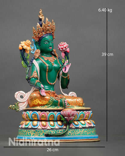 Side view of Green Tara statue ornate lotus throne copper artwork gold gilded sacred sculpture Himalayan craftsmanship Nepal