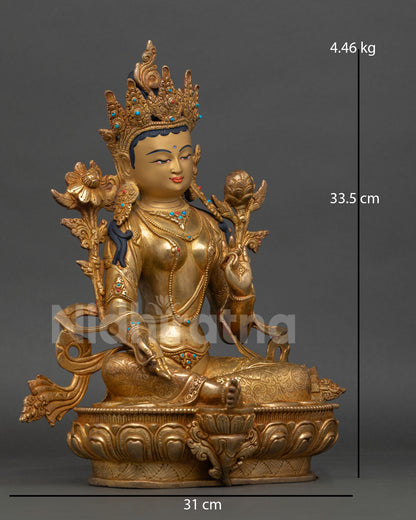 Side view of Green Tara Statue, right leg extended, blooming lotus seat, Himalayan Buddhist copper sculpture, meditation art