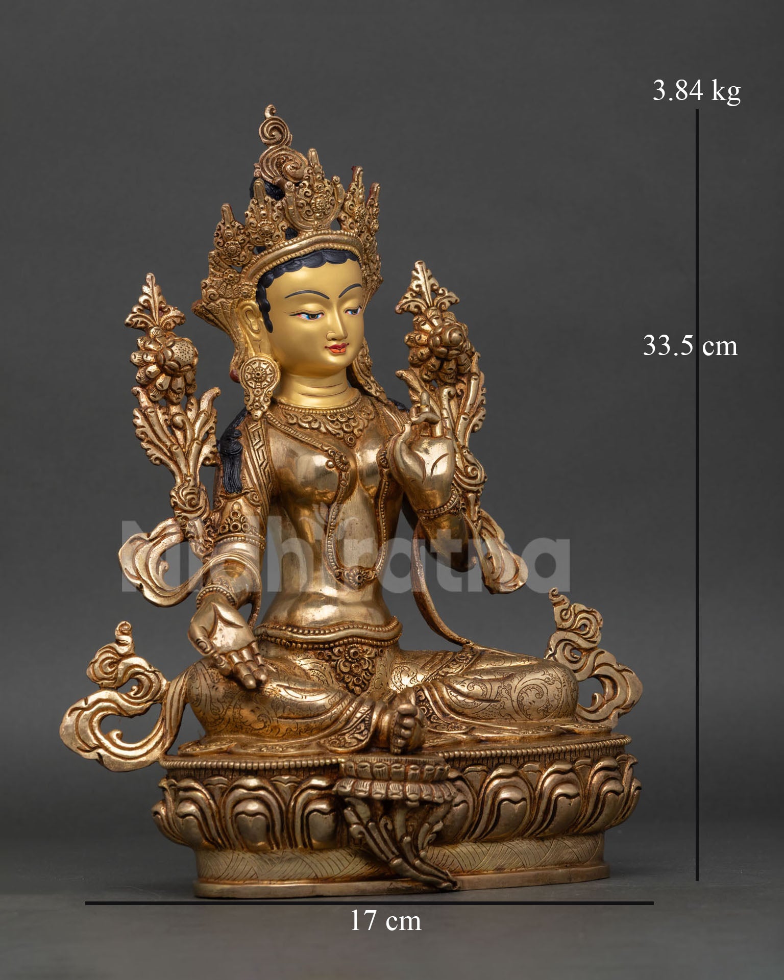 Side view of Green Tara statue, seated posture, lotus base, copper gold fire gilded, Himalayan sculpture