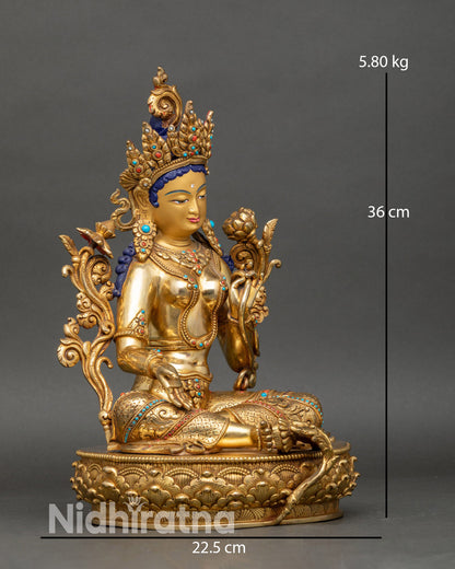 Side view Green Tara statue varada abhaya mudras utpala flower