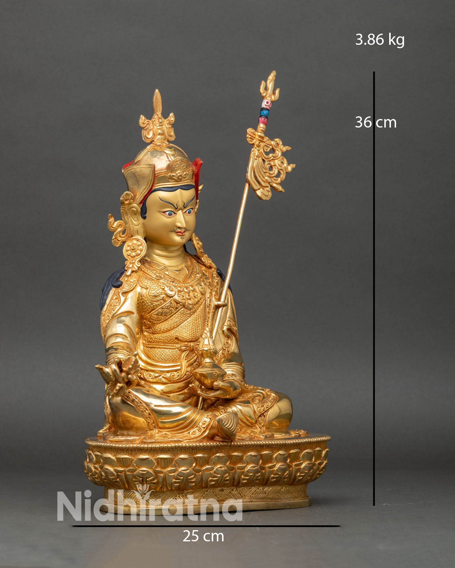 Side view Guru Rinpoche copper gold statue lotus throne Buddhist deity