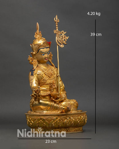 Side view Guru Rinpoche statue lotus throne vajra skull cup trident staff spiritual decor