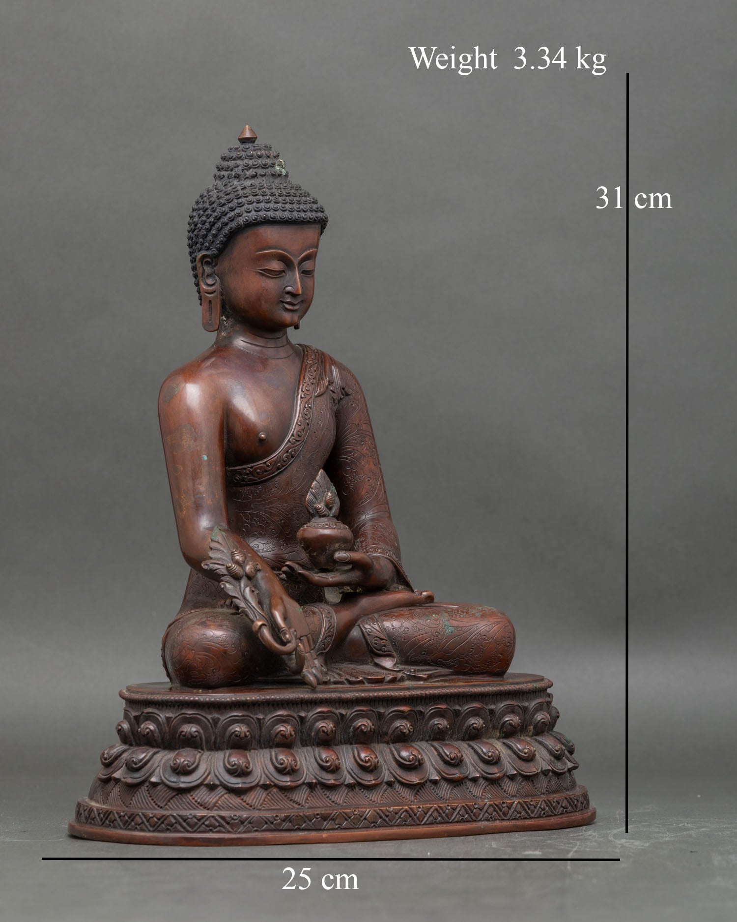 Side view handcrafted Himalayan Medicine Buddha statue with detailed copper finish