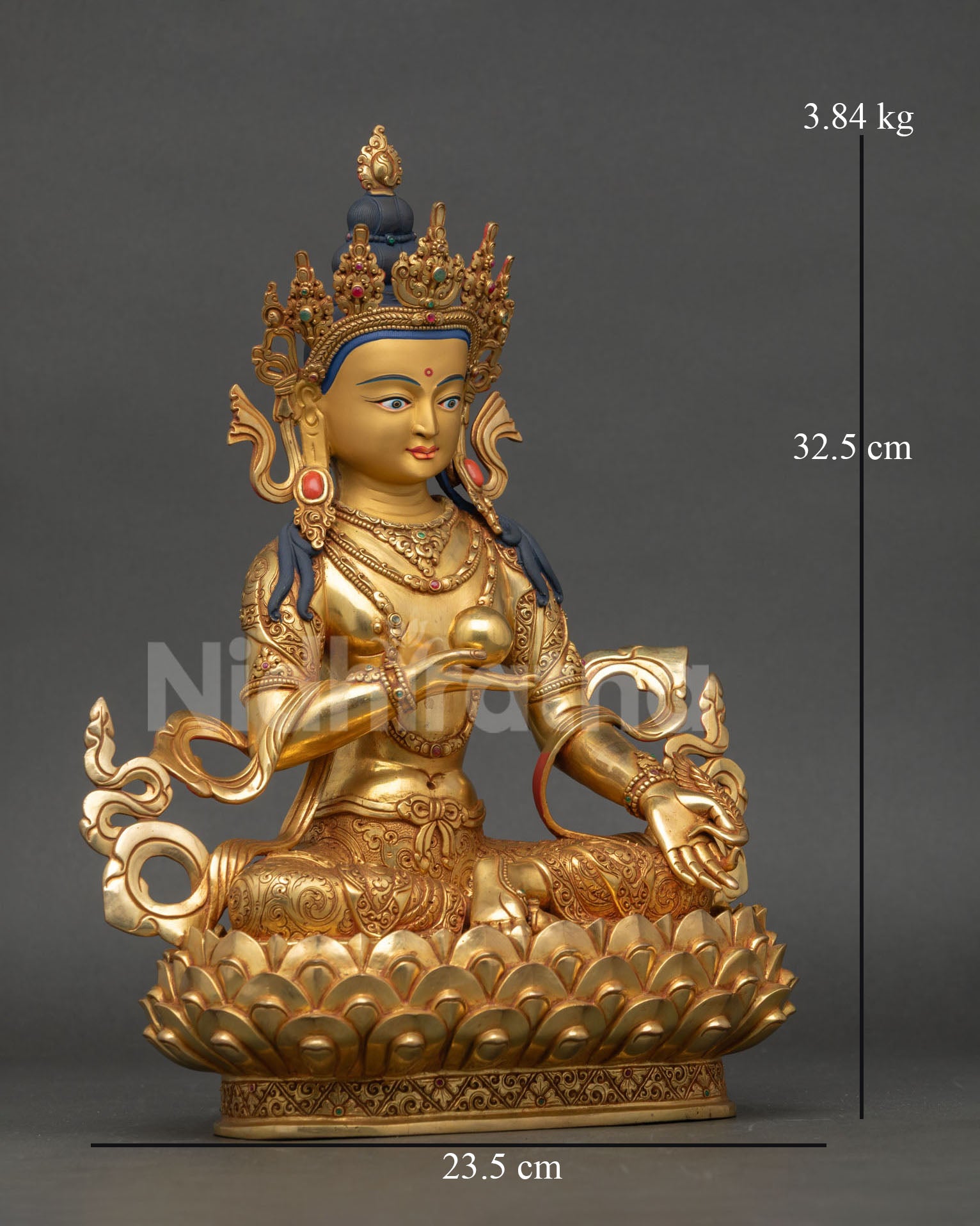 Side view of handcrafted Kshitigarbha statue, highlighting serene posture lotus base and sacred wish fulfilling jewel for spiritual home decor.