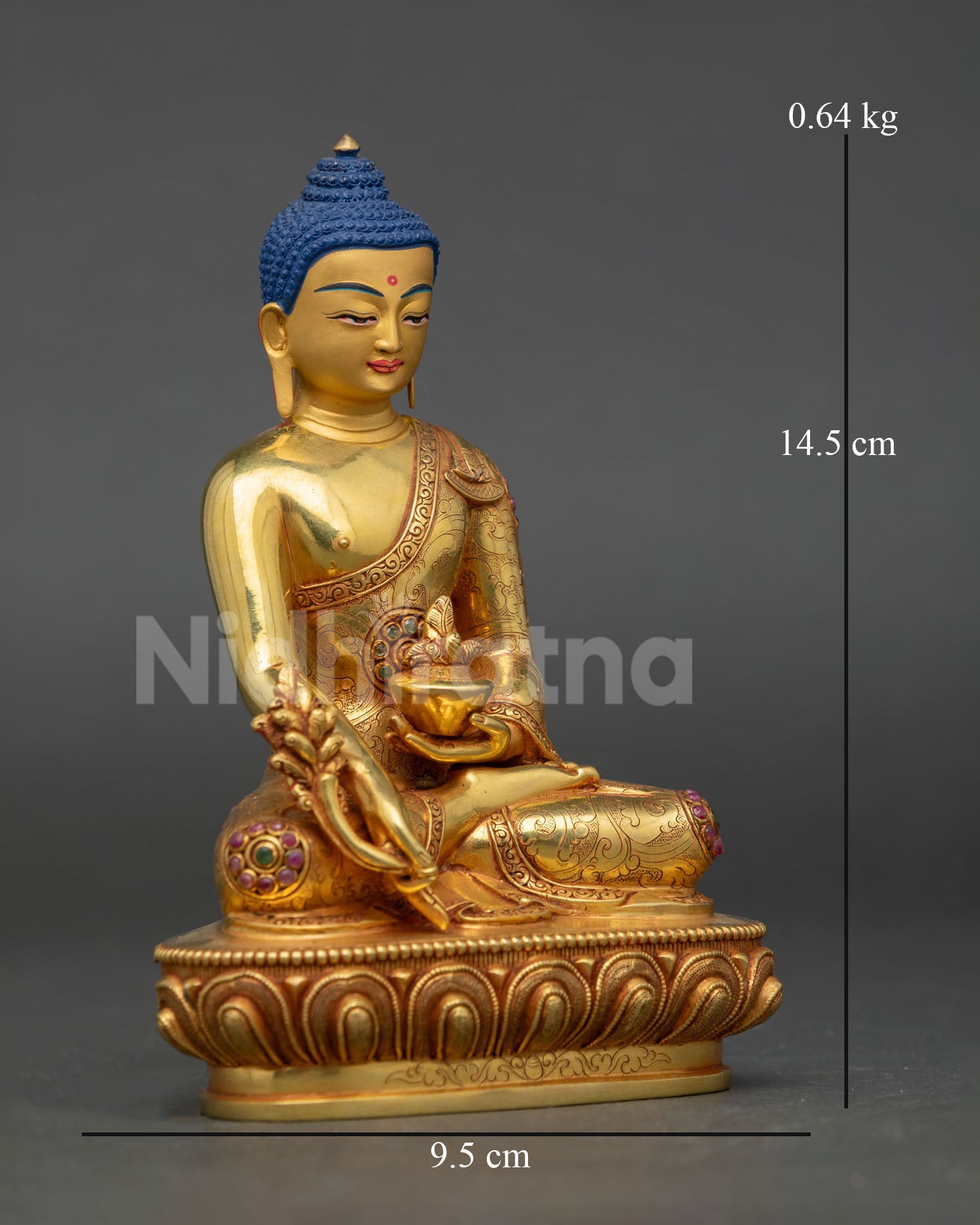 Side view of handcrafted Medicine Buddha statue in meditative posture with radiant gold gilded finish and detailed Himalayan Buddhist artistry