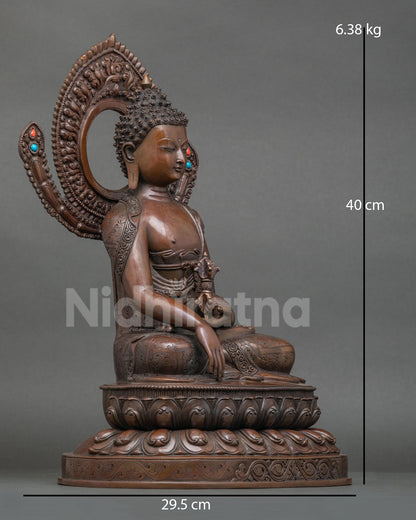 Side view of a handcrafted Mitrugpa Buddha sculpture with detailed robes 