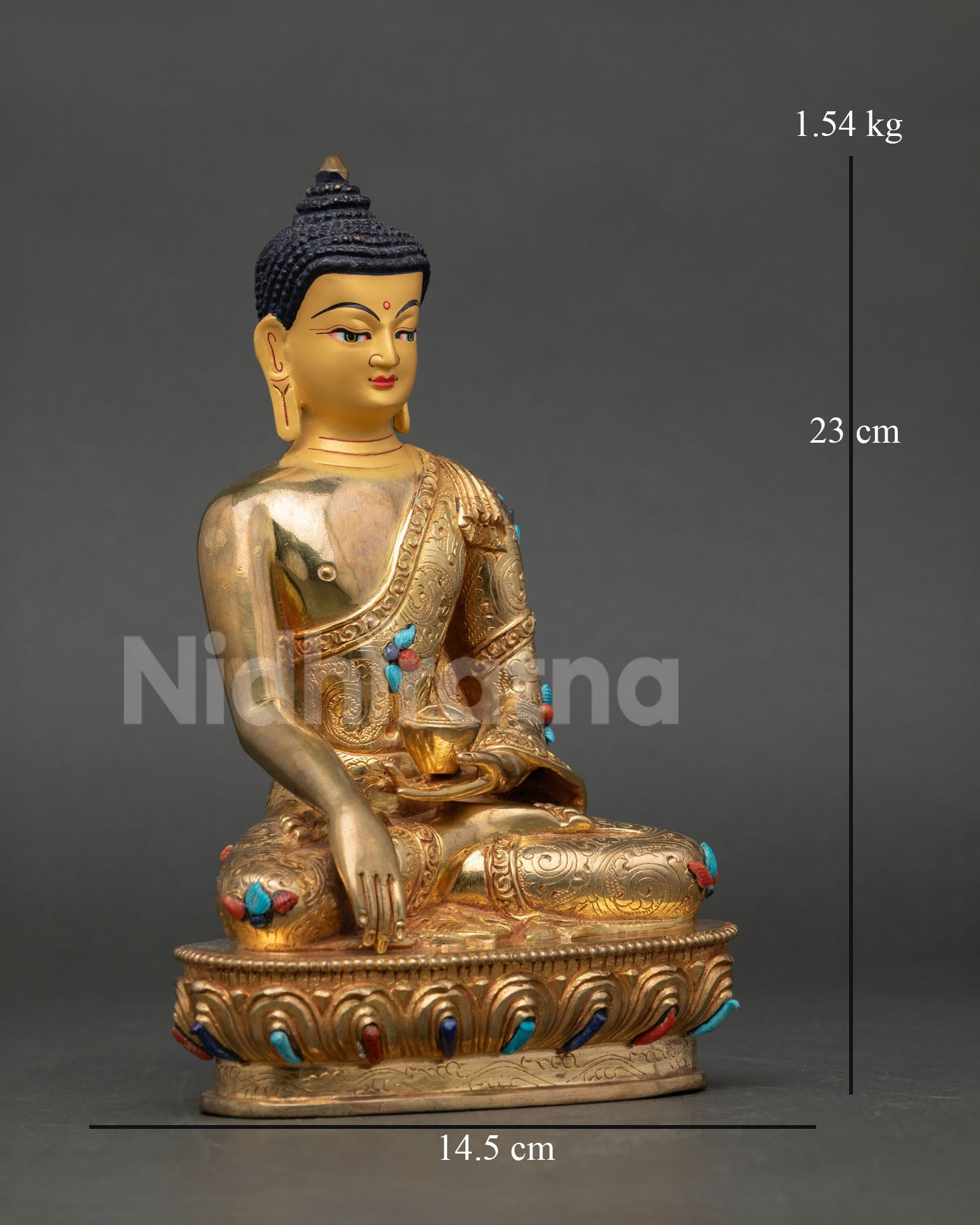 Side view of handcrafted Shakyamuni Buddha on lotus pedestal with monastic robe details Nepal Newari artisan Buddhist sculpture for altar