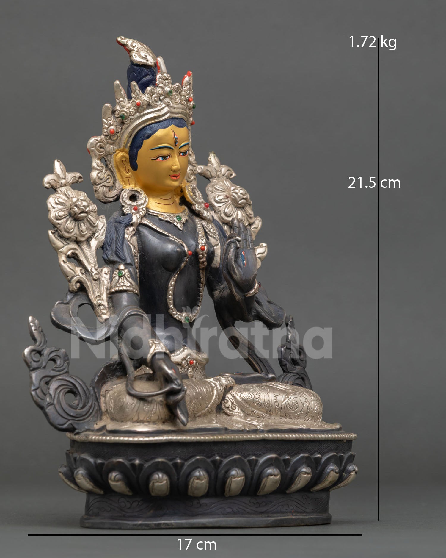 Side view of handcrafted White Tara statue from Nepal, serene expression ideal for Buddhist meditation and shrine decor.