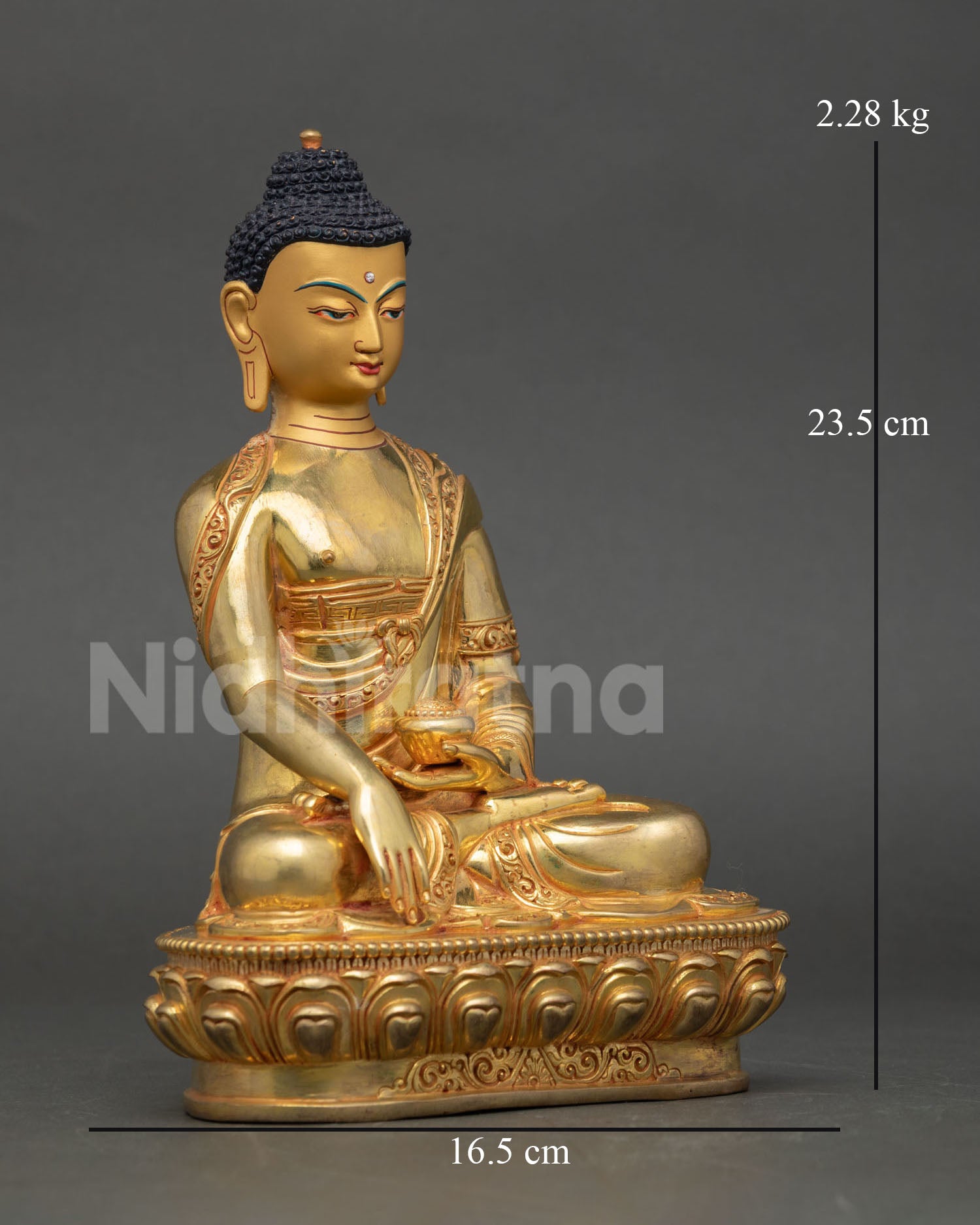 Side view of handmade Buddha Shakyamuni statue showing monastic robe lotus base and begging bowl Nepal Newari artisan copper sculpture