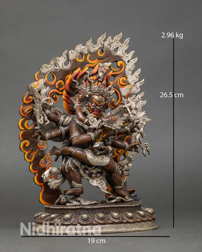 Side view of Hayagriva statue wings feathers sword vajra lasso Himalayan craftsmanship