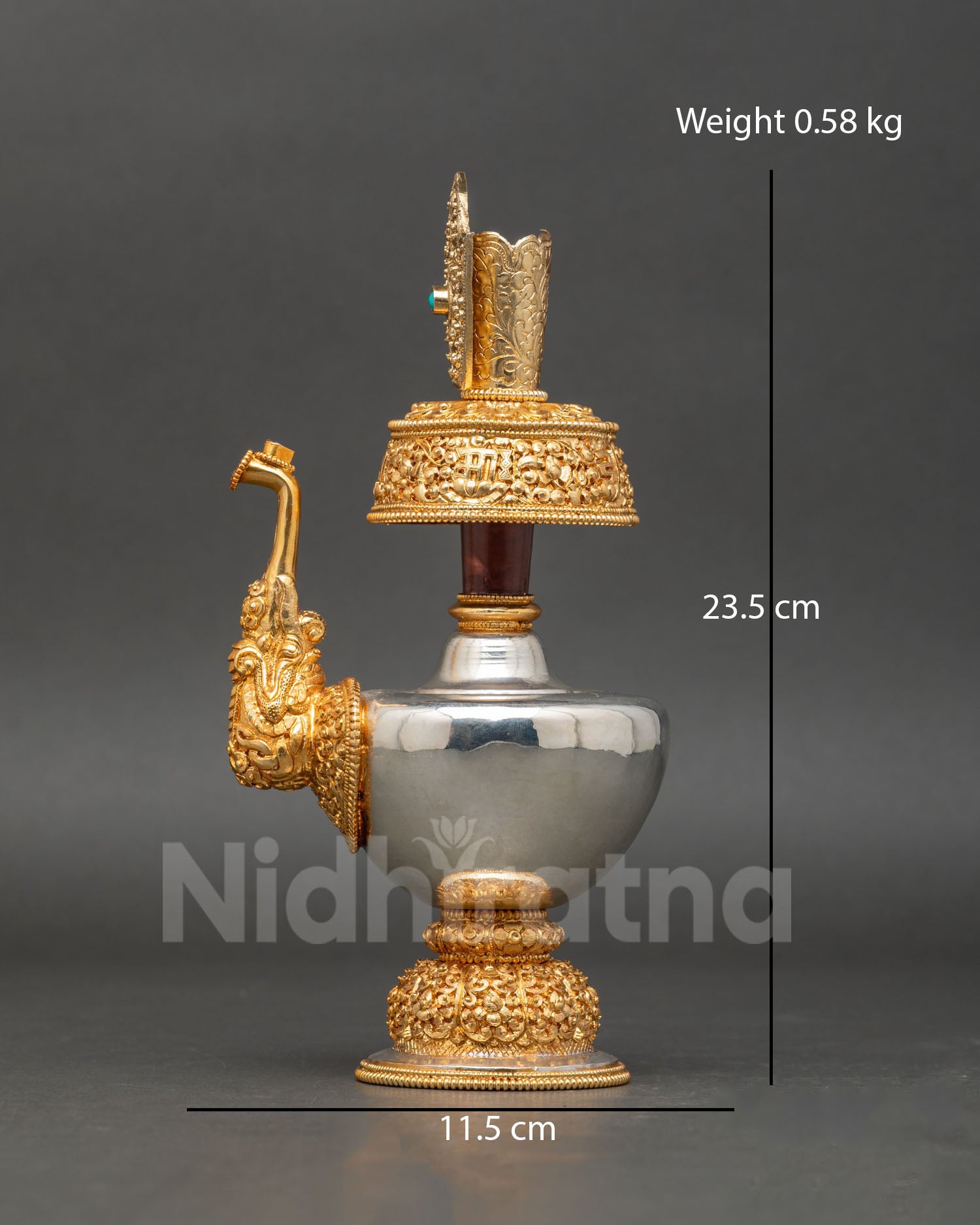 side view himalayan bhumba vessel curved body gold plated base floral carving handcrafted nepal buddhist ceremonial art
