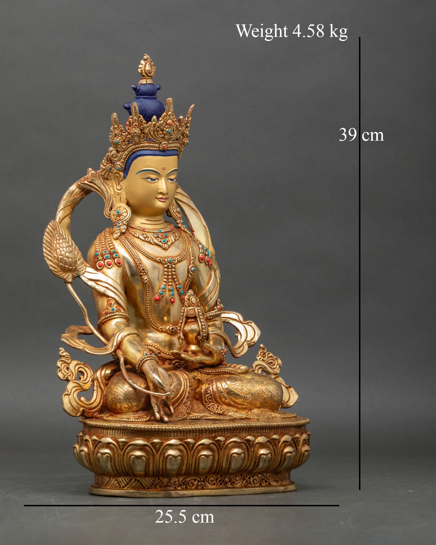 Side view of Himalayan Kshitigarbha Buddha statue with hand-painted gold face and copper body