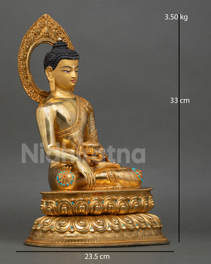 Side view of Himalayan Shakyamuni Buddha statue with floral carved monastic robe