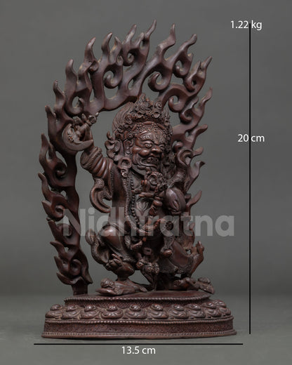Side view of Mahakala Bernagchen statue Dharma protector deity from Karma Kagyu lineage, copper sculpture with intricate traditional Nepalese artistry
