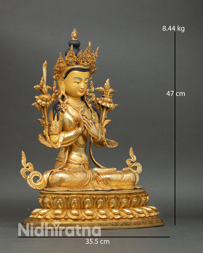 Side view Manjushree statue double lotus throne right leg extended lotus flower Dharmachakra mudra copper gold detailing Nepal
