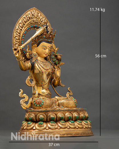 Side view Manjushri statue flaming sword of wisdom utpala flower Prajnaparamita scripture copper gold gilded Vajrayana meditation deity art
