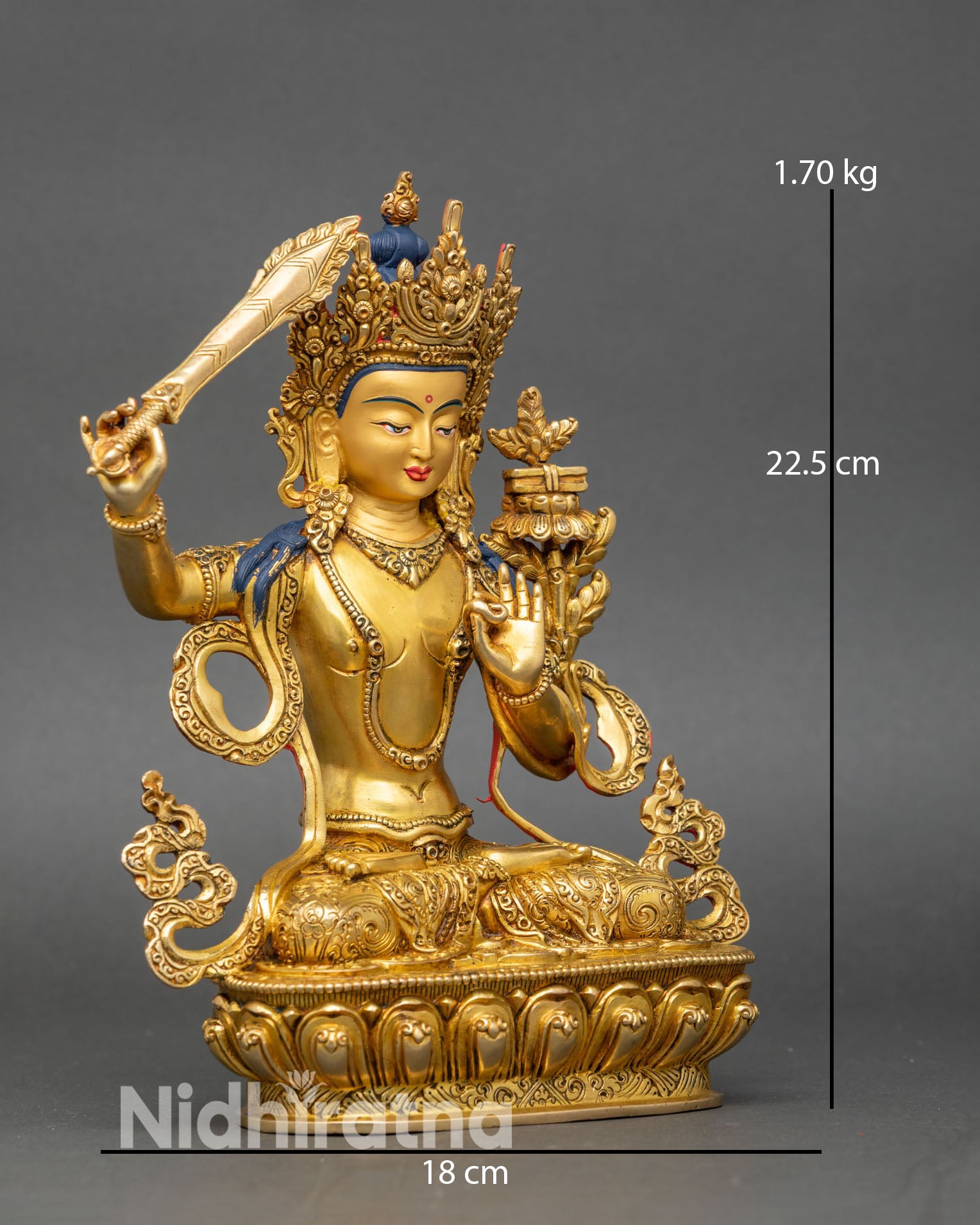 Side view Manjushri statue handcrafted Nepali copper gold sacred attributes