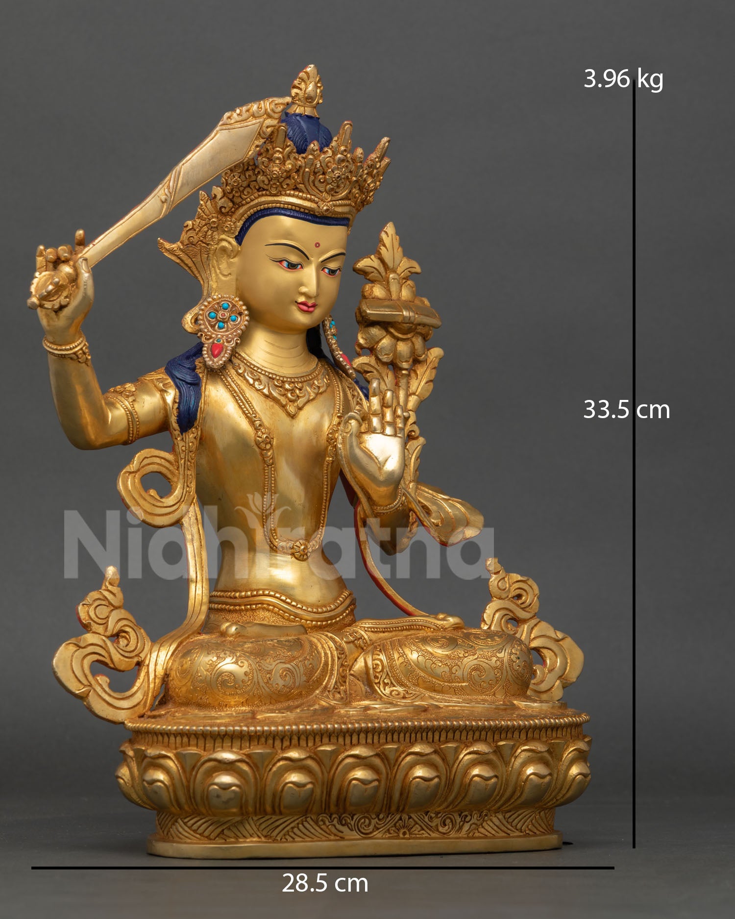 Side view of Manjushri Statue, lost wax casting, copper sculpture, gold detailing, semi-precious stones, Nepal art