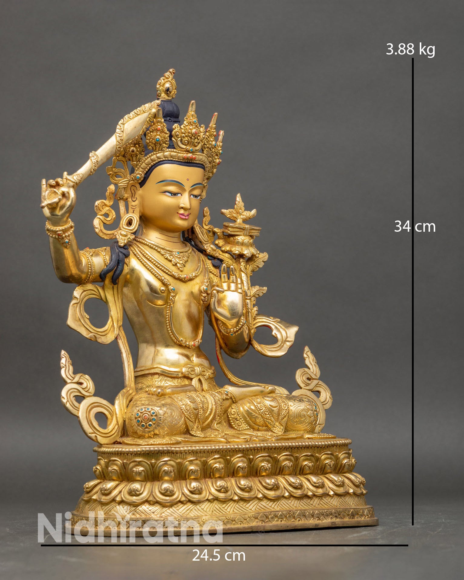 Side view of Manjushri statue ornate robes double lotus pedestal handcrafted Nepalese artisan spiritual empowerment