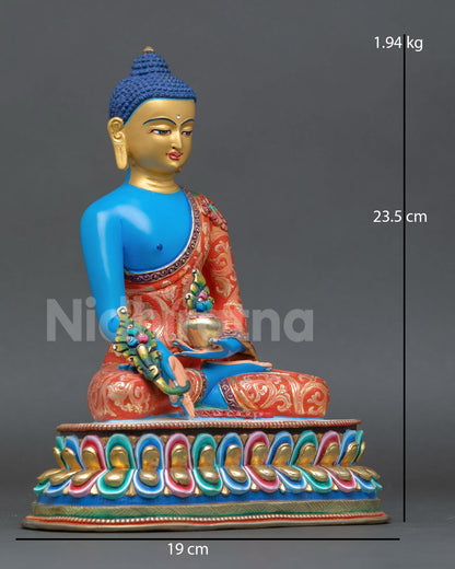 Side view of Medicine Buddha statue blue body sculpture holding Medicine Bowl with copper metalwork and sacred Nepalese craftsmanship