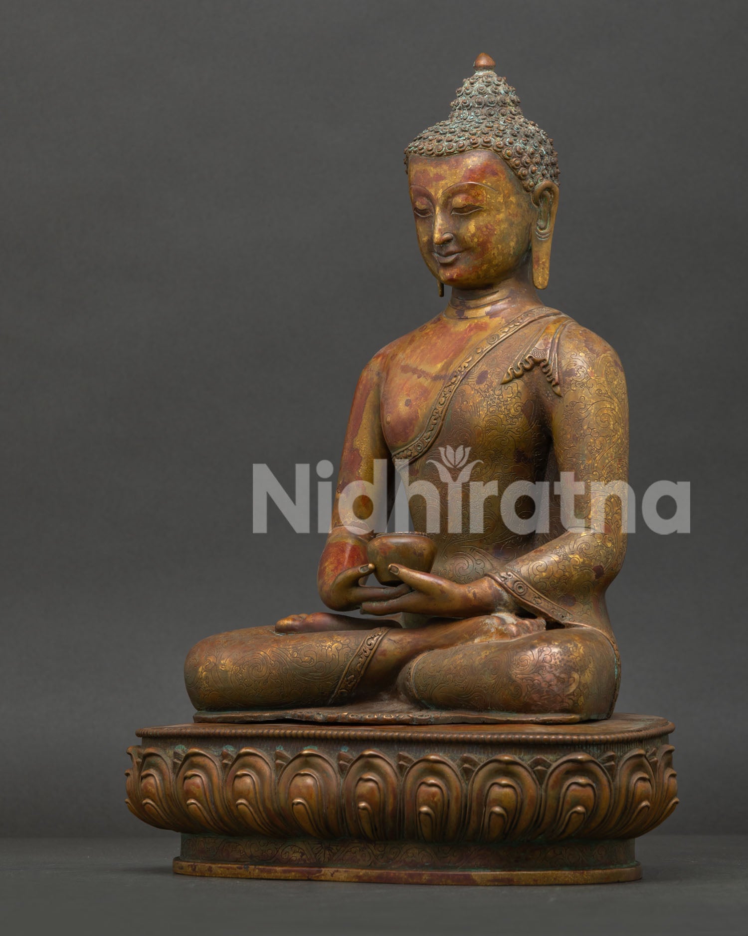 Side view of Amitabha Buddha statue showing intricate handcarved monk robe and Himalayan copper craftsmanship.