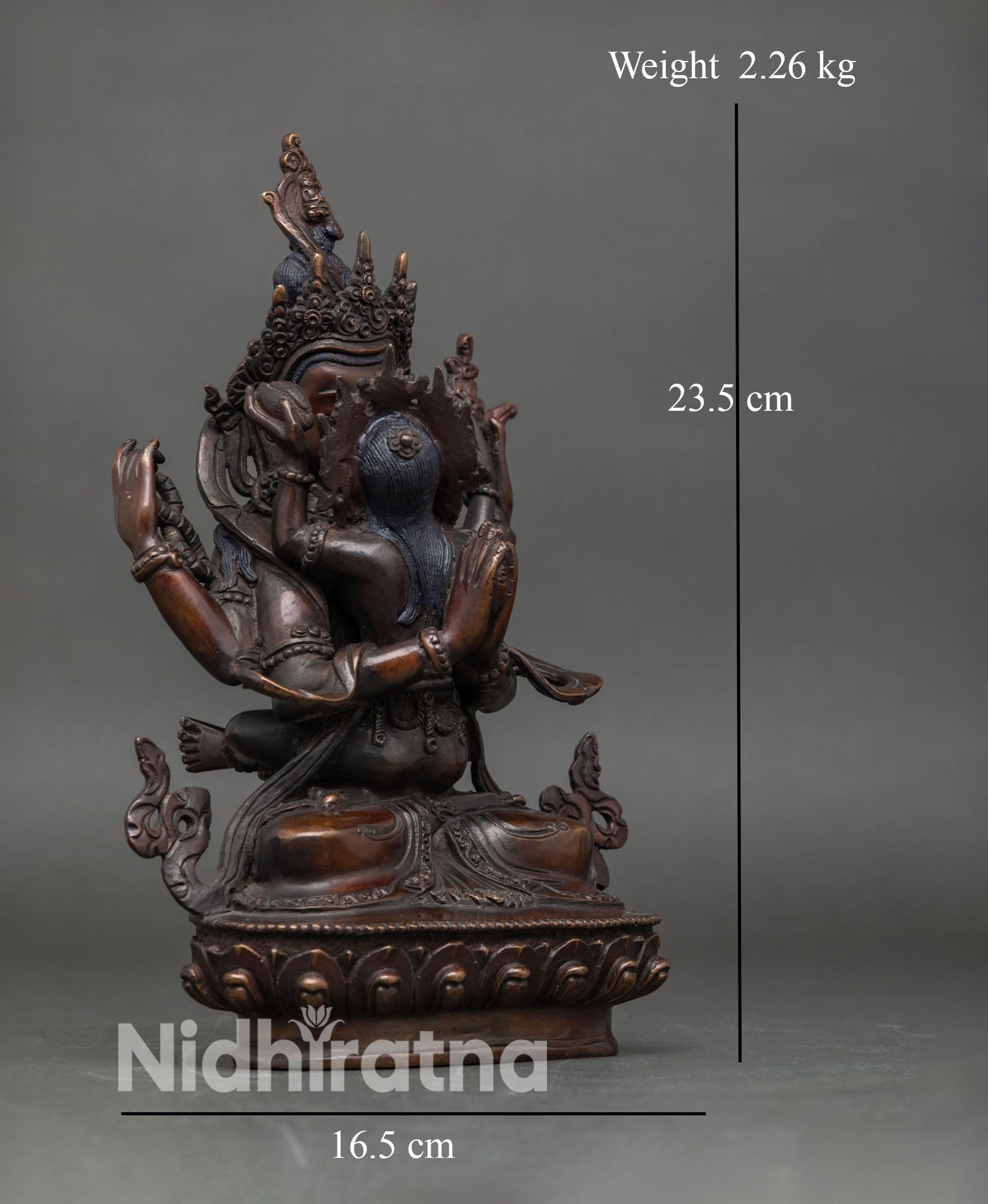 side view of chenrezig consort statue chenrezig with añjali mudra cintamani blooming blue lotus copper artisan