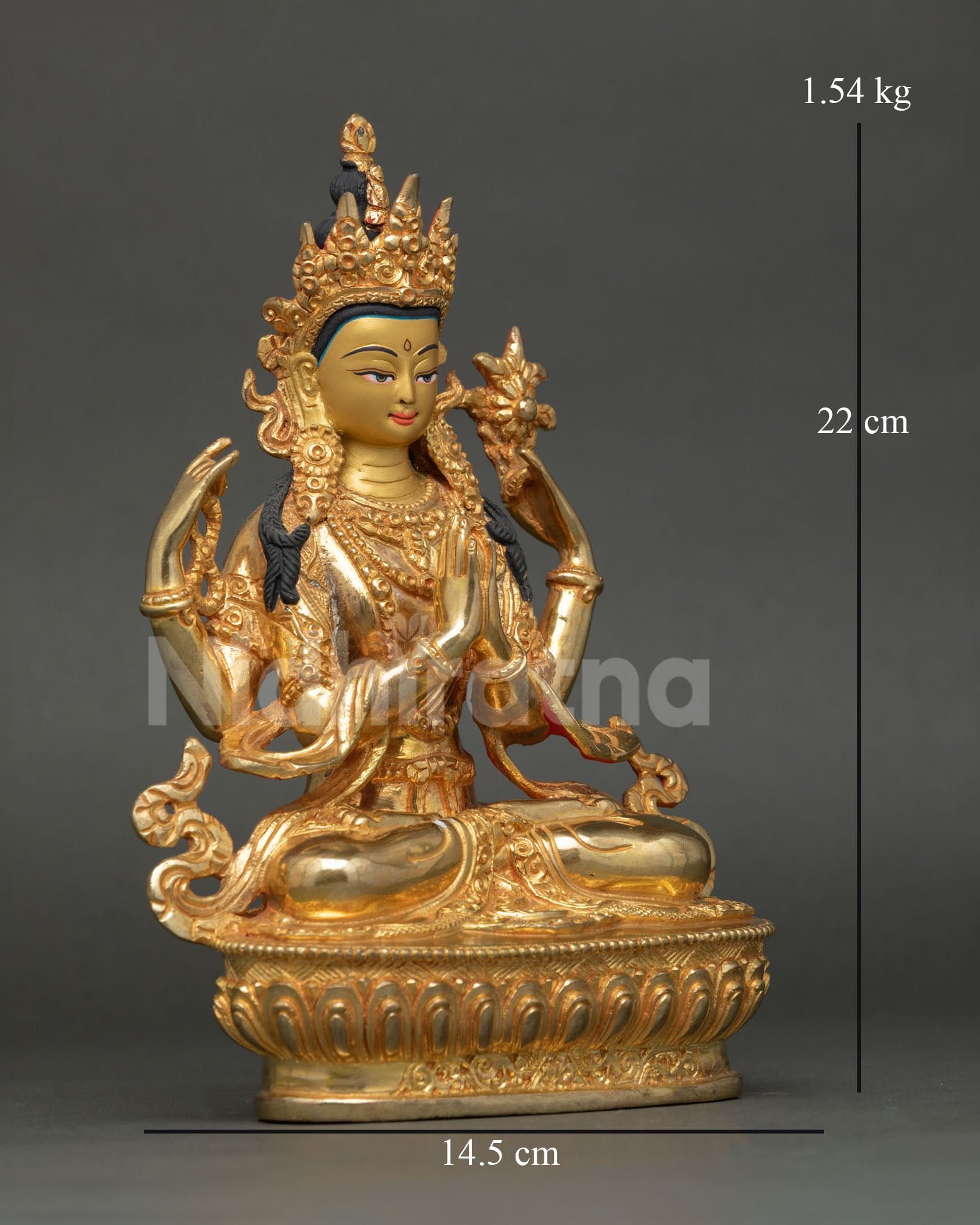 Side view of Chenrezig statue, highlighting four armed form holding prayer jewel, crystal mala, and lotus with intricate gold accents.