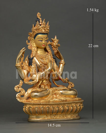 Side view of Chenrezig statue, highlighting four armed form holding prayer jewel, crystal mala, and lotus with intricate gold accents.