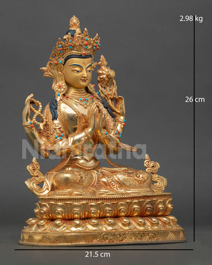 Side view of Chenrezig statue seated on lotus pedestal holding wish fulfilling jewel crystal mala and lotus flower