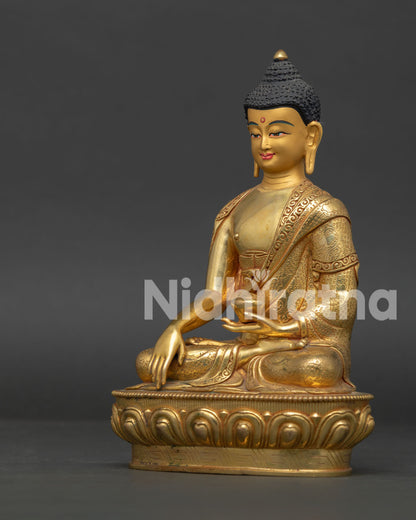 Side View of Copper Shakyamuni Buddha Statue Seated on Lotus Pedestal Handmade in Nepal.