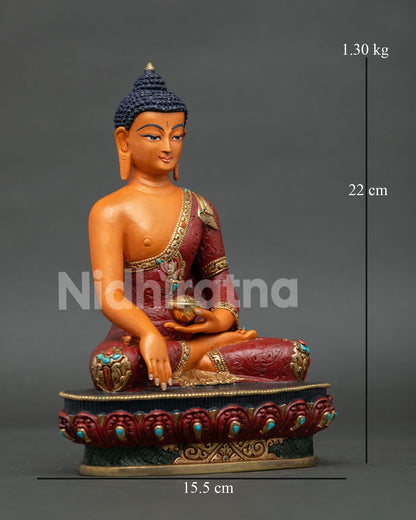 Side view of copper Shakyamuni Buddha statue with traditional Nepalese artistry