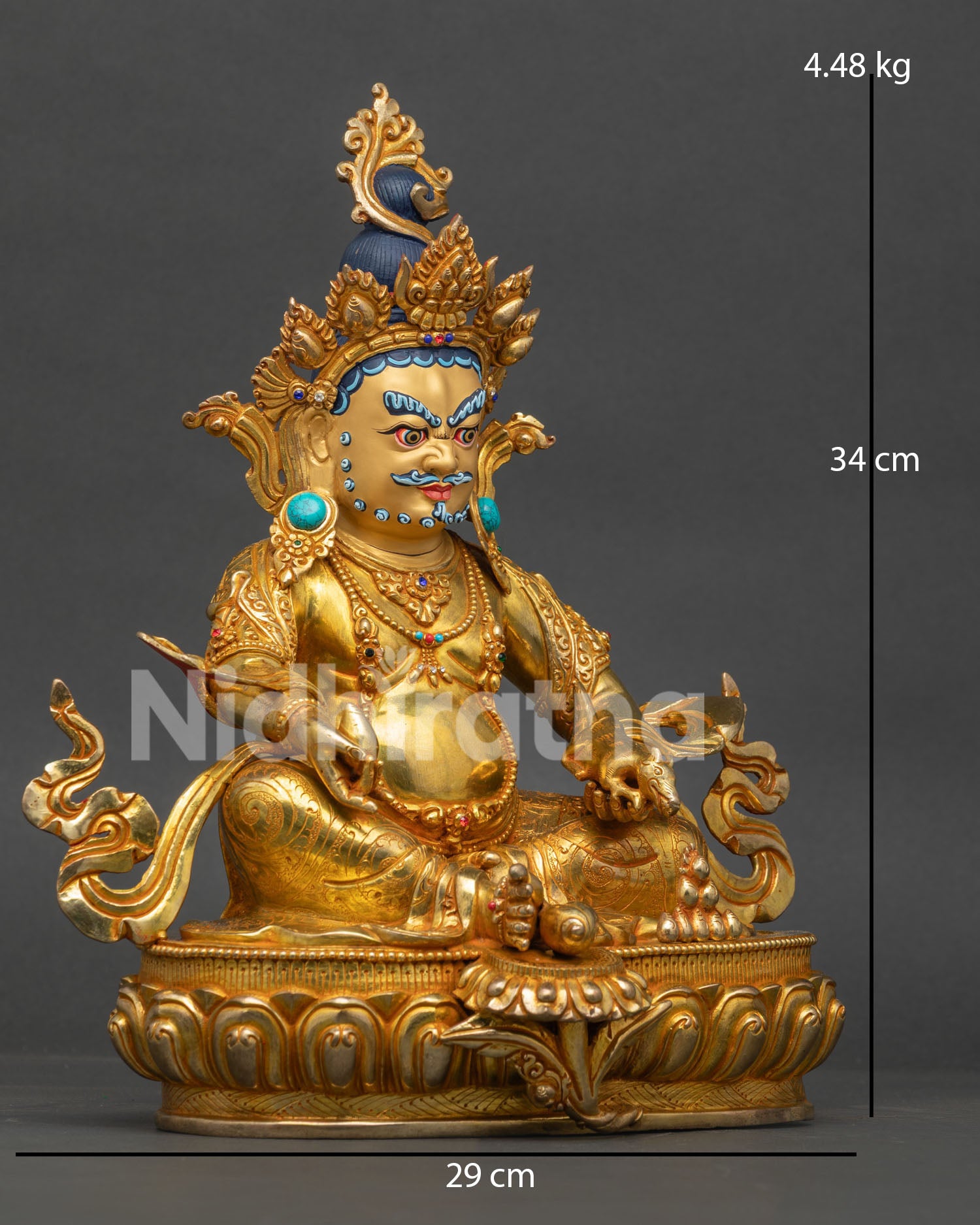 Side view of Dzambhala Statue with 24K gold fire gilding, mongoose, sacred ornaments, and copper craftsmanship from Nepal