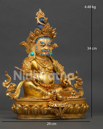 Side view of Dzambhala Statue with 24K gold fire gilding, mongoose, sacred ornaments, and copper craftsmanship from Nepal