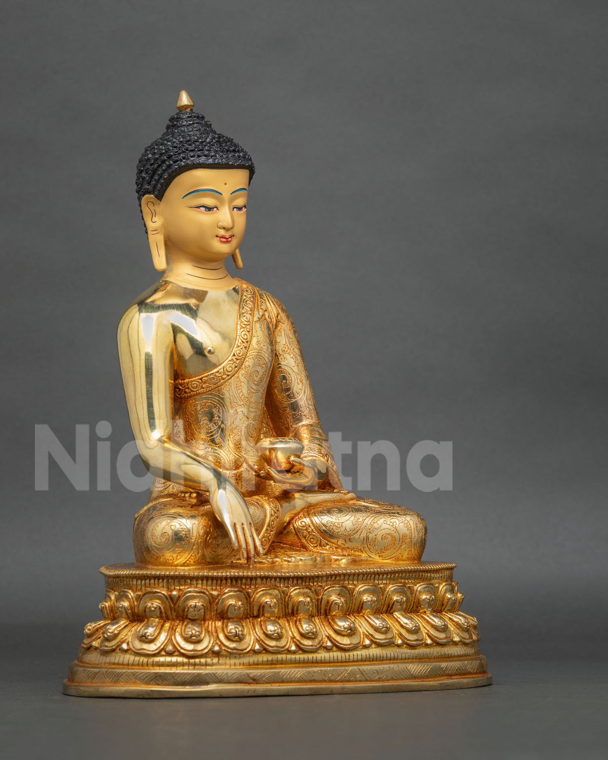 Side view of Gautama Buddha Statue showing the Earth-Touching Mudra, sacred patra bowl, and intricate Nepalese Buddhist craftsmanship.