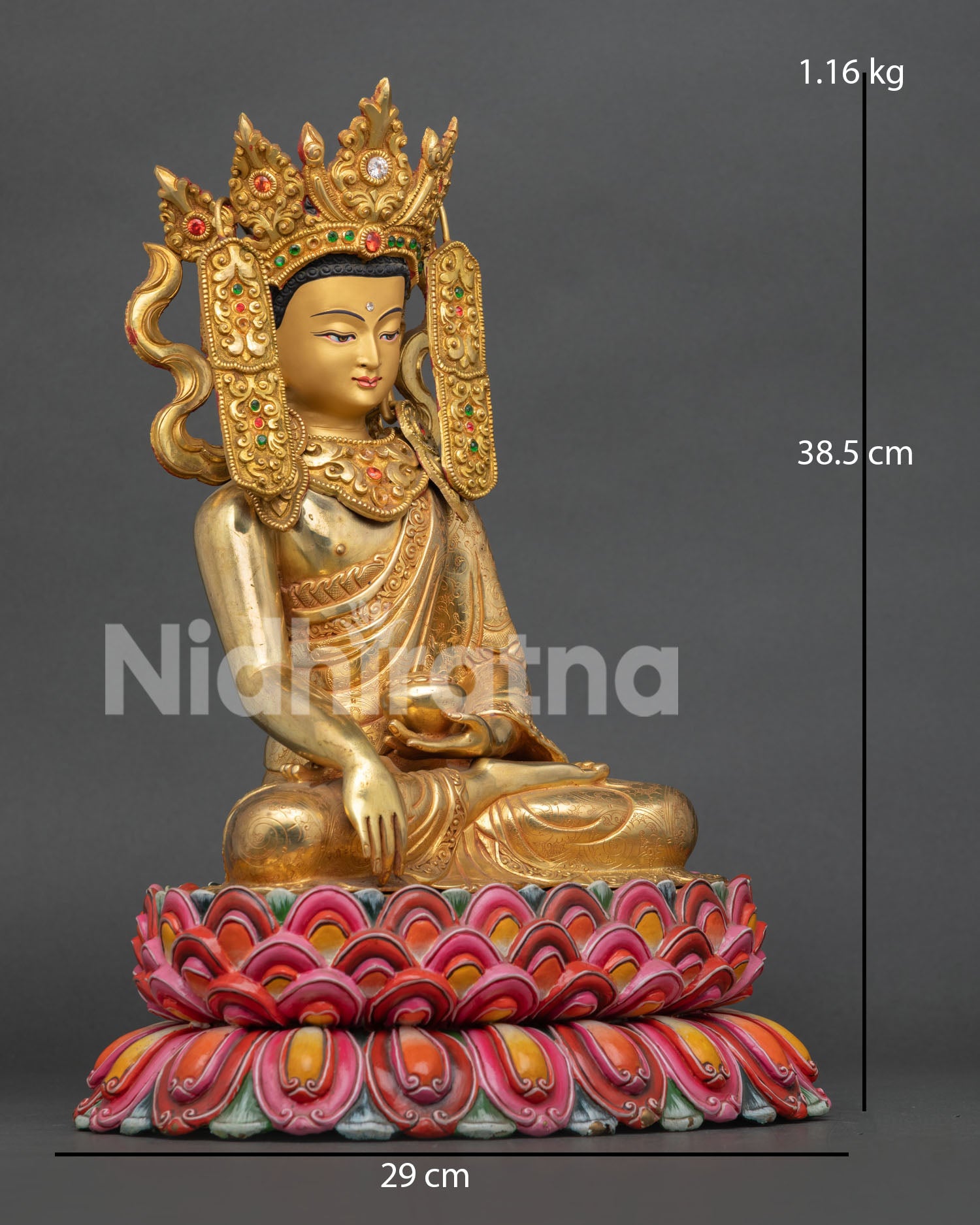 Side view of gold gilded Jowo Shakyamuni Buddha sculpture highlighting the detailed monk robe patterns and Himalayan metalwork.