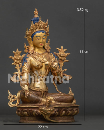 Side View of Green Tara Buddhist Statue in Lalitasana Posture on Lotus Flower