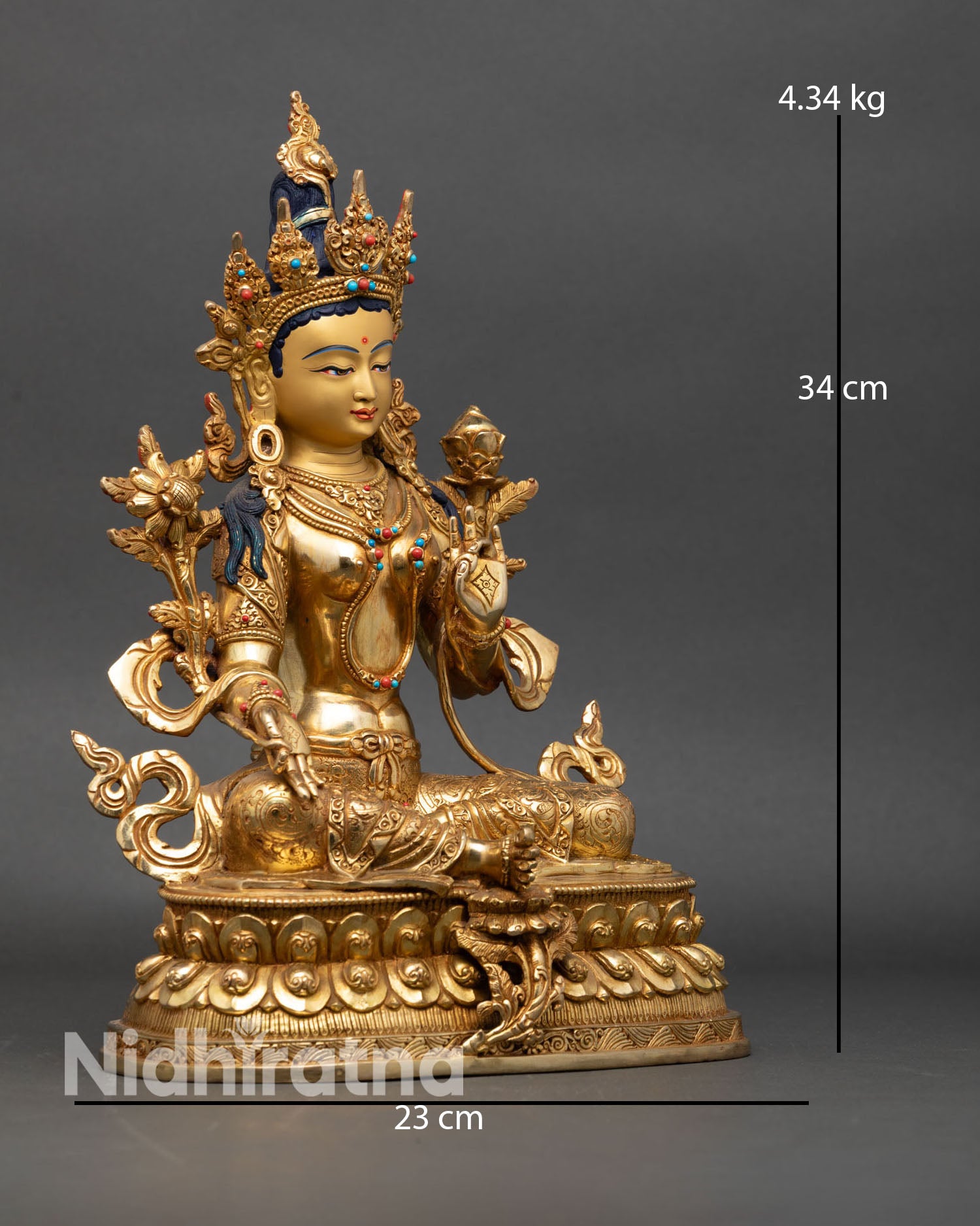 Side view of Green Tara statue double lotus pedestal right leg extended