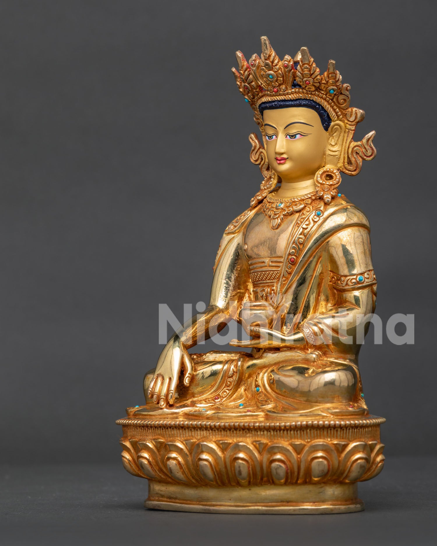 Side View of Handcrafted Crown Shakyamuni Buddha Statue with Floral Motif Garments.