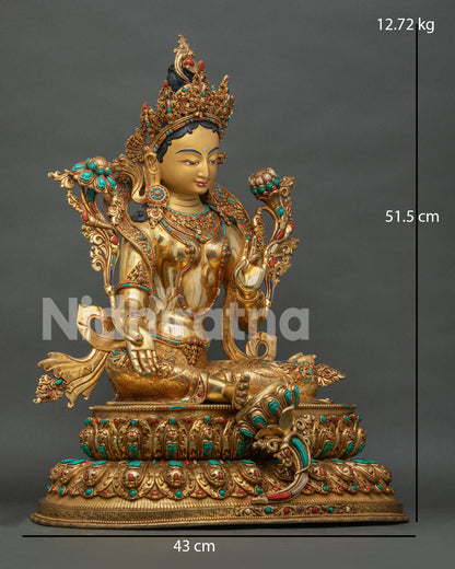 Side view of handcrafted Green Tara statue in 24K gold gilded copper from Nepal