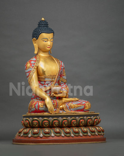 Side view of handcrafted Shakyamuni Buddha statue holding a patra bowl on a double-lotus pedestal