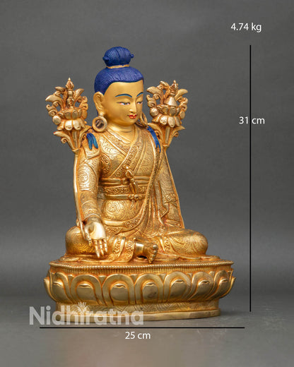Side view of Jigme Lingpa holding blessing gesture seated on carved lotus pedestal
